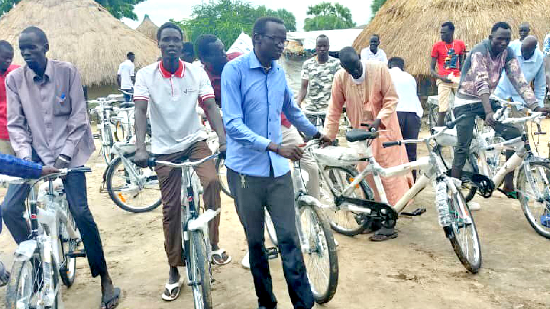 UNIDOR community workers distributing bicycles in South Sudan